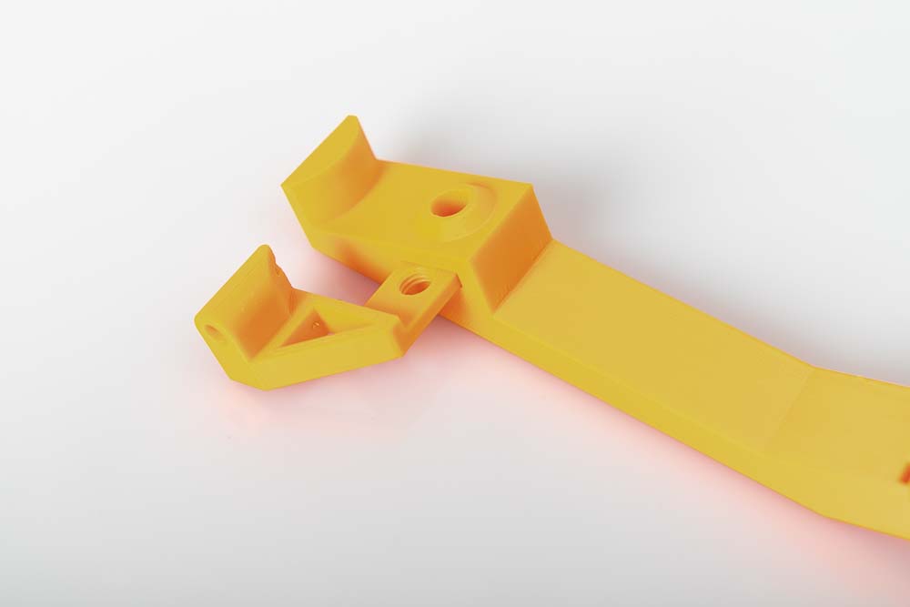 PTFE tube connector is inserted into the 3D printed arm