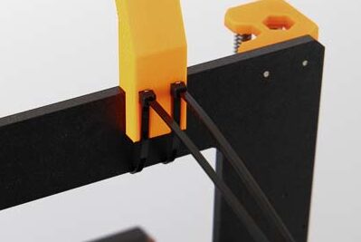 Fastening the filament guide with zip ties on the 3D printer