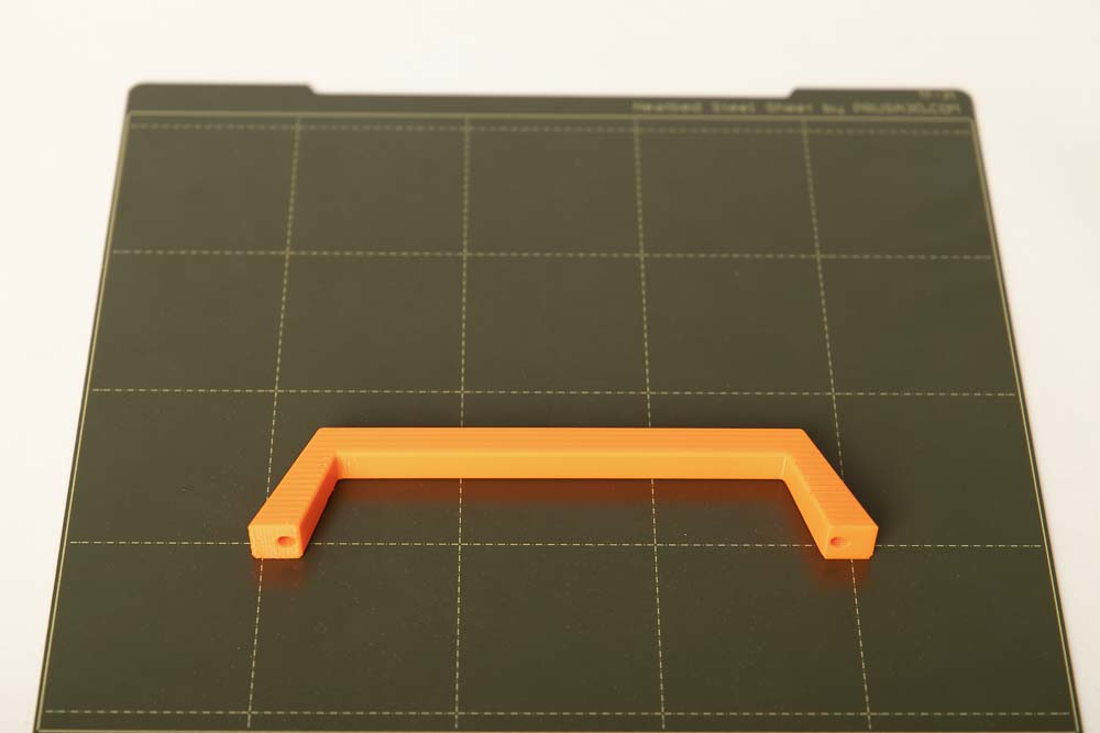 3D printed handle for the DIY 3D printer enclosure on the build plate of a 3D printer