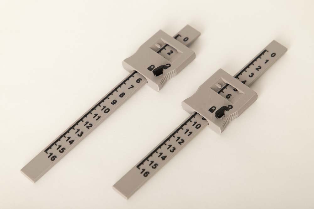 Two self-printed 3D print depth gauges or depth calipers that are required to position the brackets