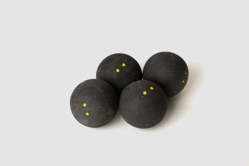 4 pieces of squash balls that can be used as damper feet instead of flexible filament 3D print parts