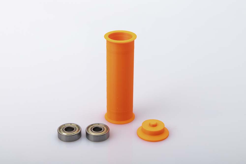 A 3D printed wide pulley, two 608 ball bearings and the 3D printed tool bearing press-in 