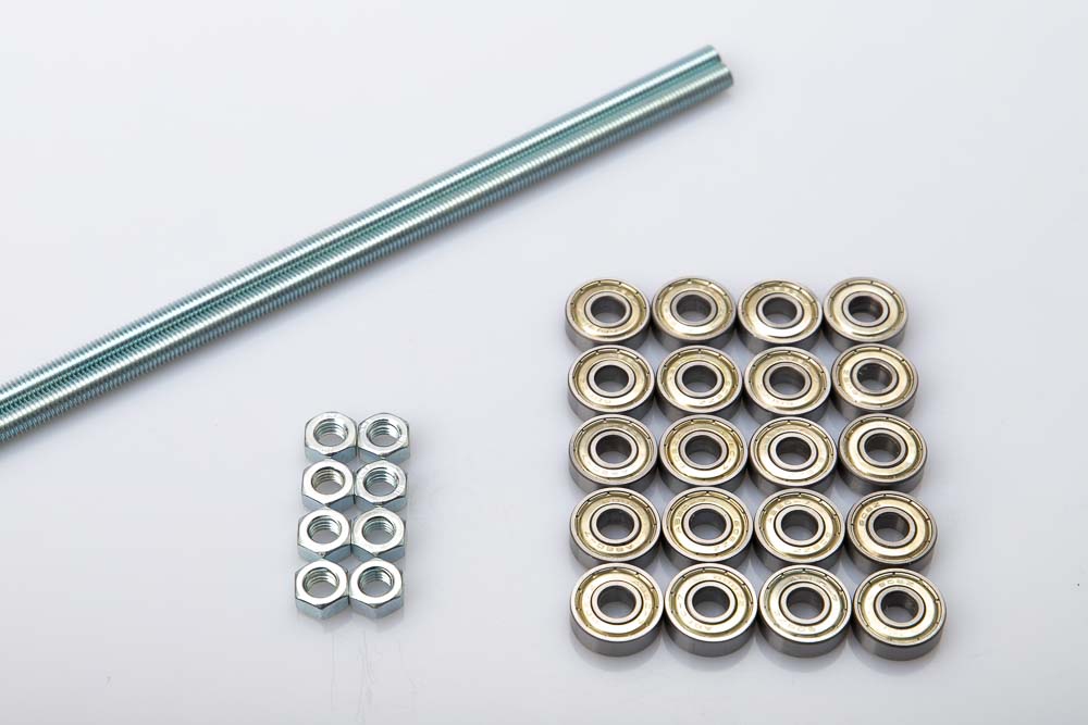 Purchased parts for the filamentspool holder with wide pulleys are shown, including 2 pieces of M8 threaded rods, 8 pieces of M8 nuts and 20 pieces of 608 ball bearings