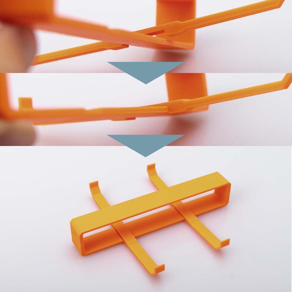 Clipping in the 3D printed side supports is shown here in three individual pictures. The side support is used in the first picture. In the second picture the support is pushed down and snaps into the bracket. In the third picture, both side supports are mounted in the bracket.