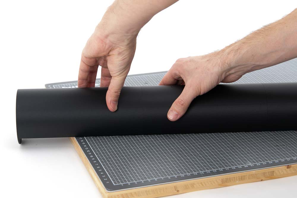 Compressing the outer part with the inner pieces of the 3D printed pendant lamp