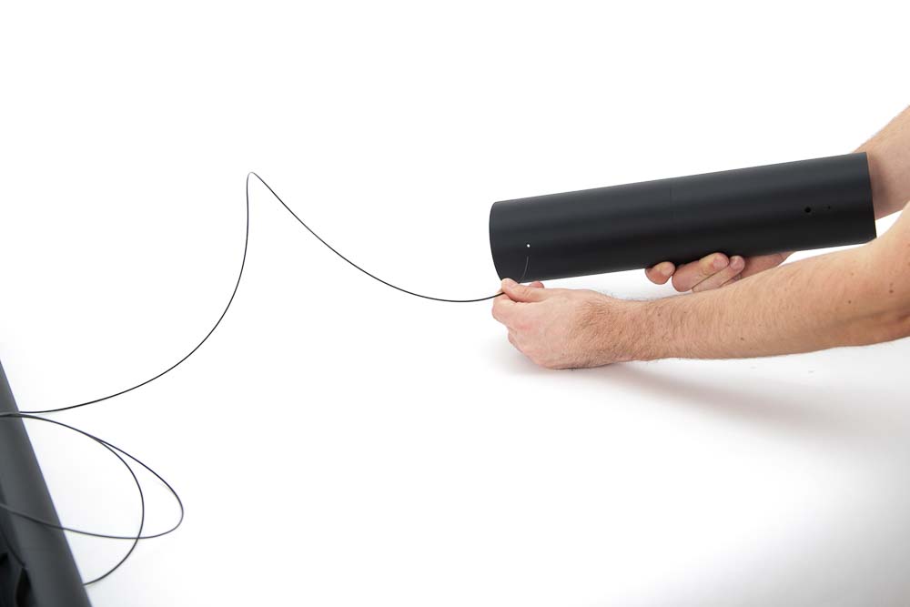 Filament is threaded into the 3D print ceiling panel