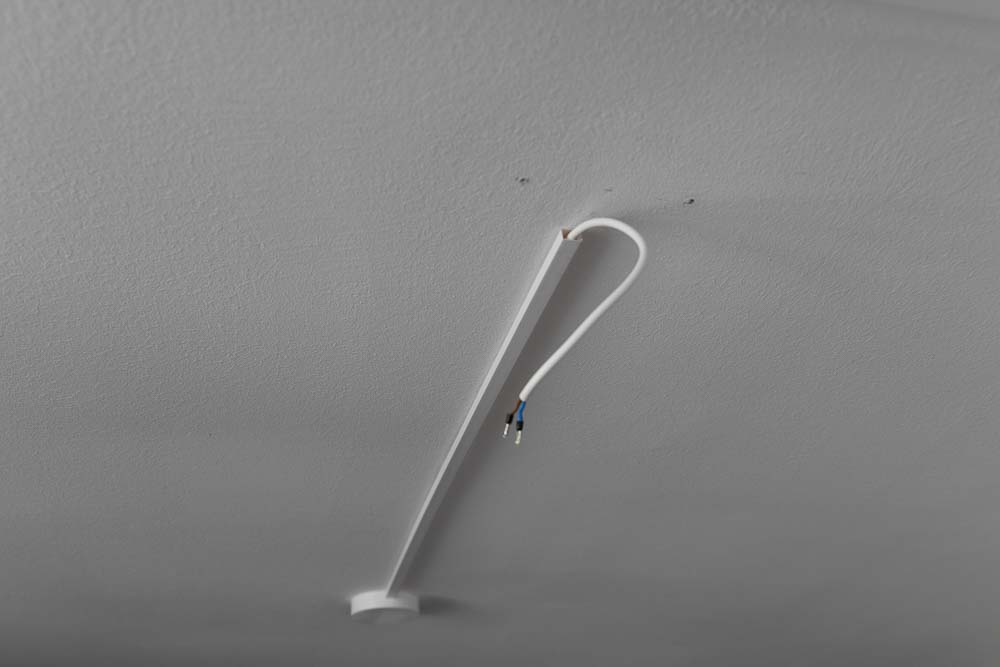 Ceiling where the 3D printed pendant light is to be mounted. The power cable has been routed to the spot using an extension and a cover.