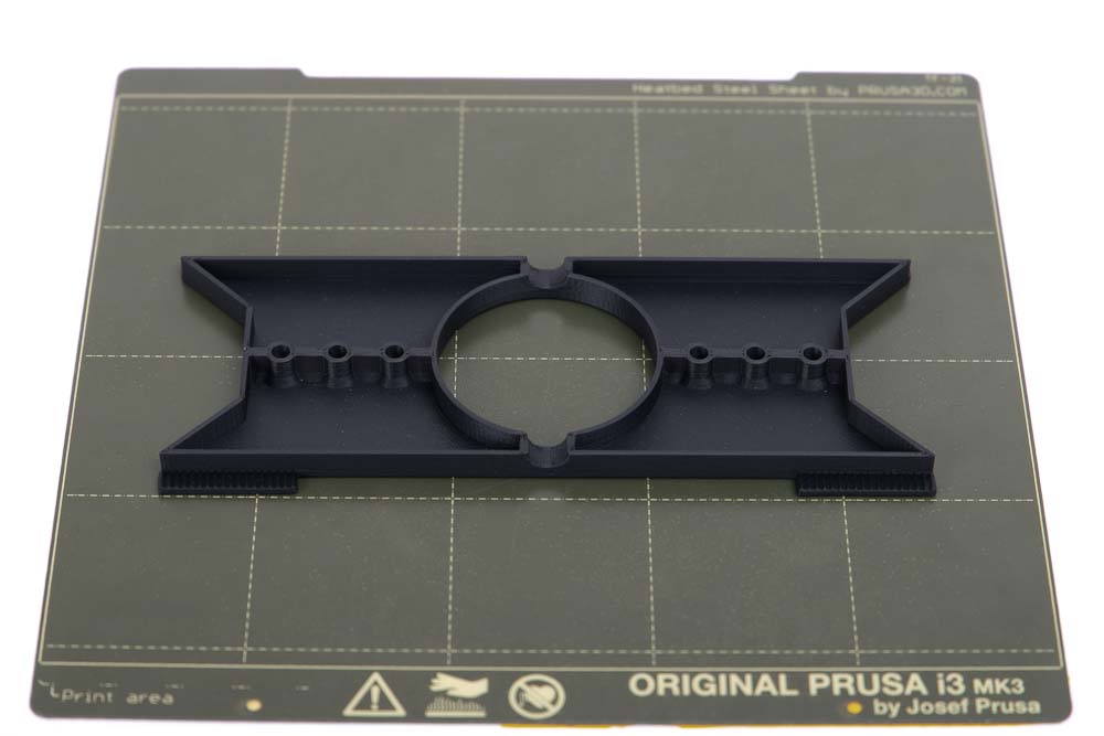 3D printed ceiling mount of the 3D printed LED pendant light on a print plate of a Prusa MK3s 3D printer