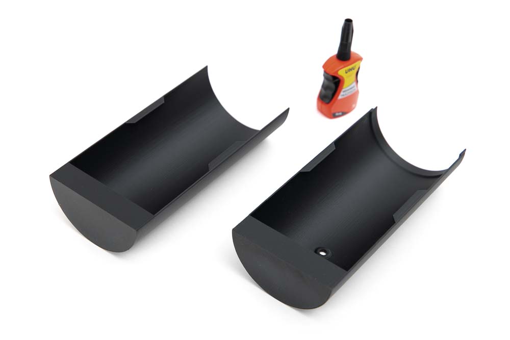 Superglue and the two 3D printed ceiling panel parts of the 3D printed lamp