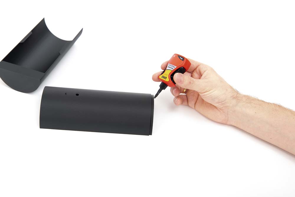 Applying adhesive to the 3D printed ceiling panel parts